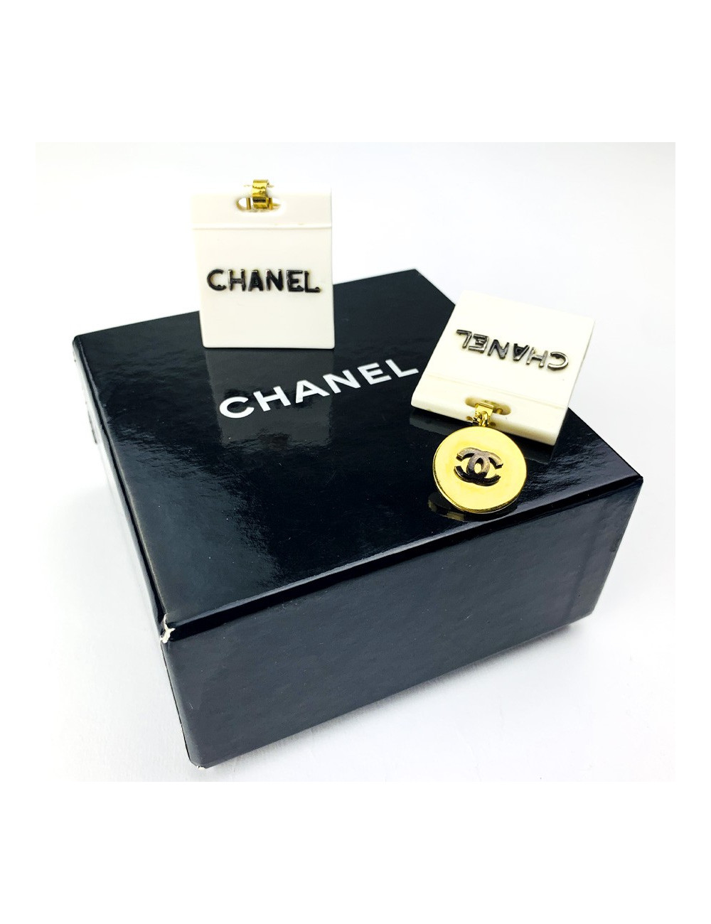 Clips d'oreille CHANEL sacs beige