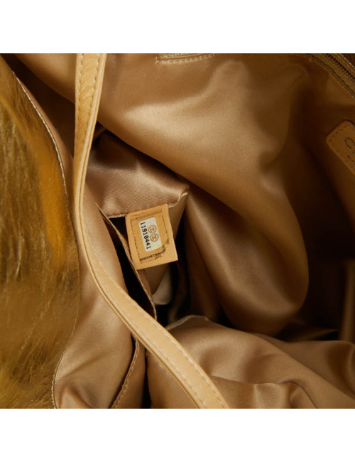 Sac CHANEL cuir perforé doré 
