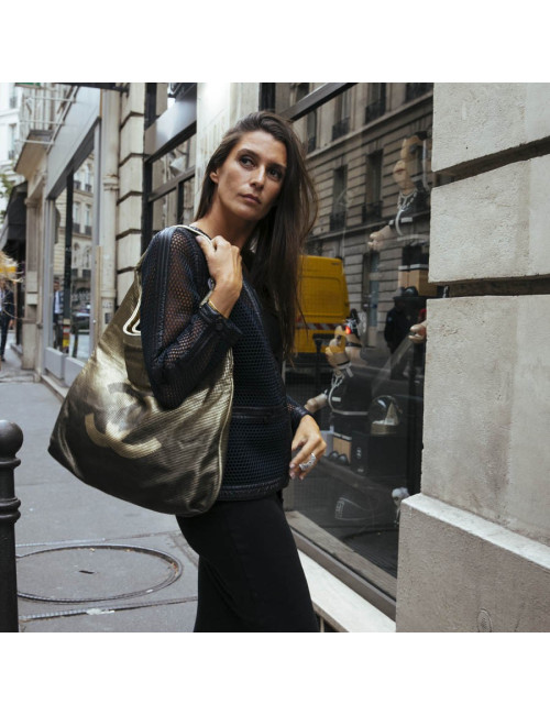 Sac CHANEL cuir perforé doré 