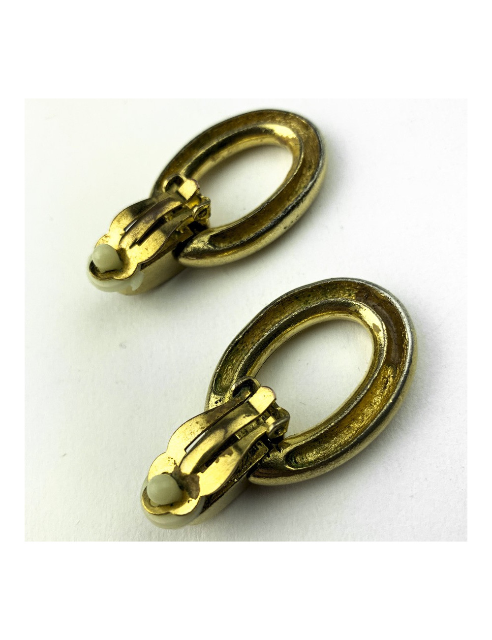 Boucles d'oreille clips pendantes DIOR dorées