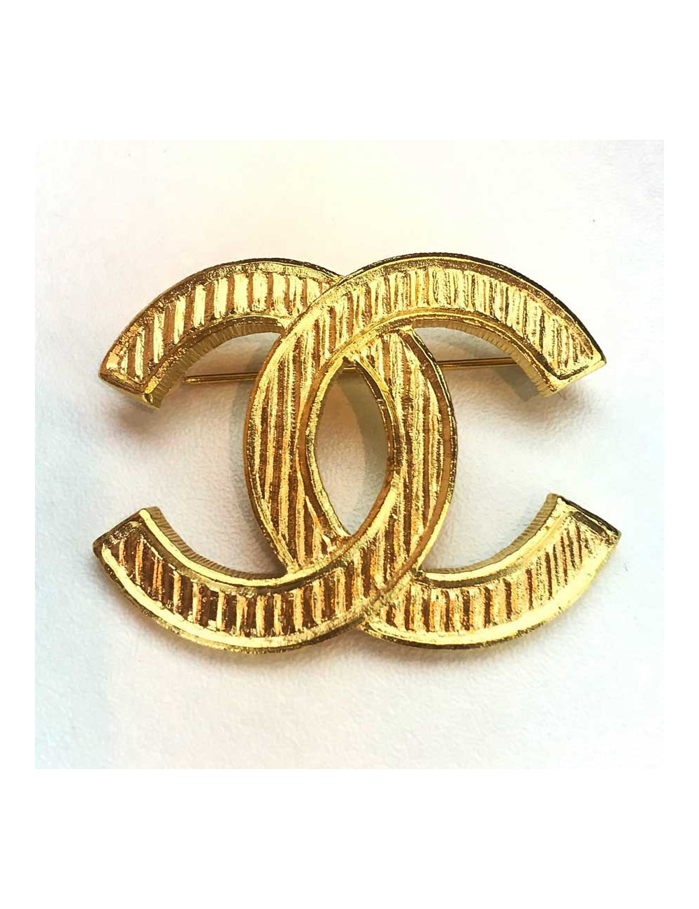Broche CHANEL CC métal doré