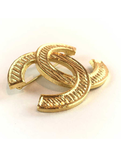 Broche CHANEL CC métal doré