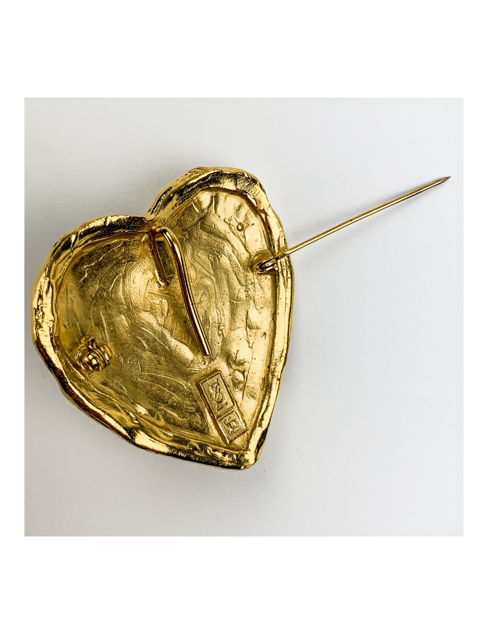 Broche DIOR dorée pate de verre marron