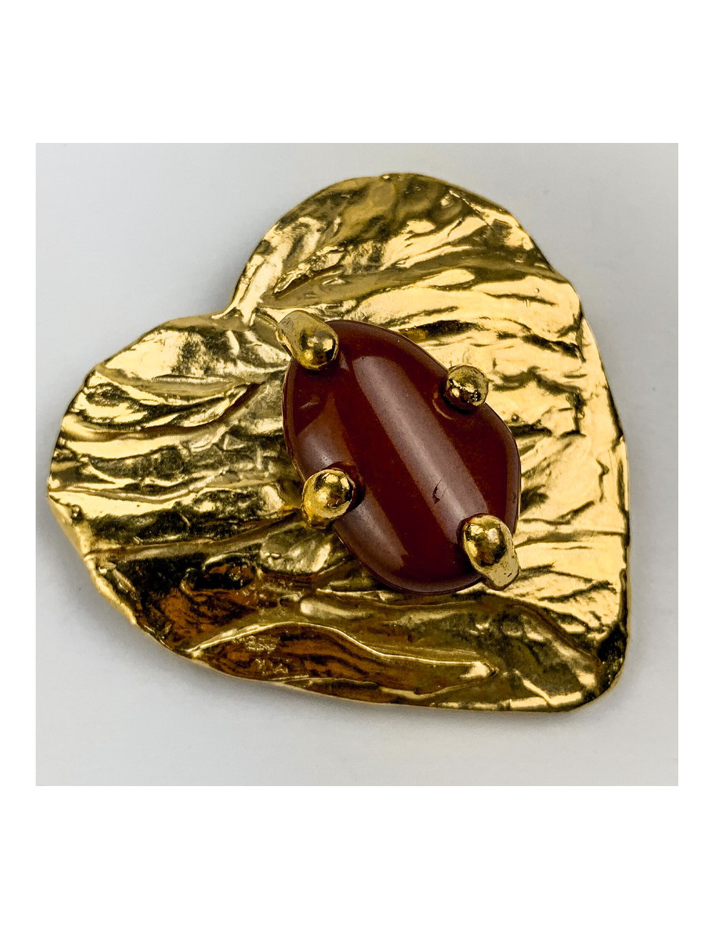 Broche DIOR dorée pate de verre marron