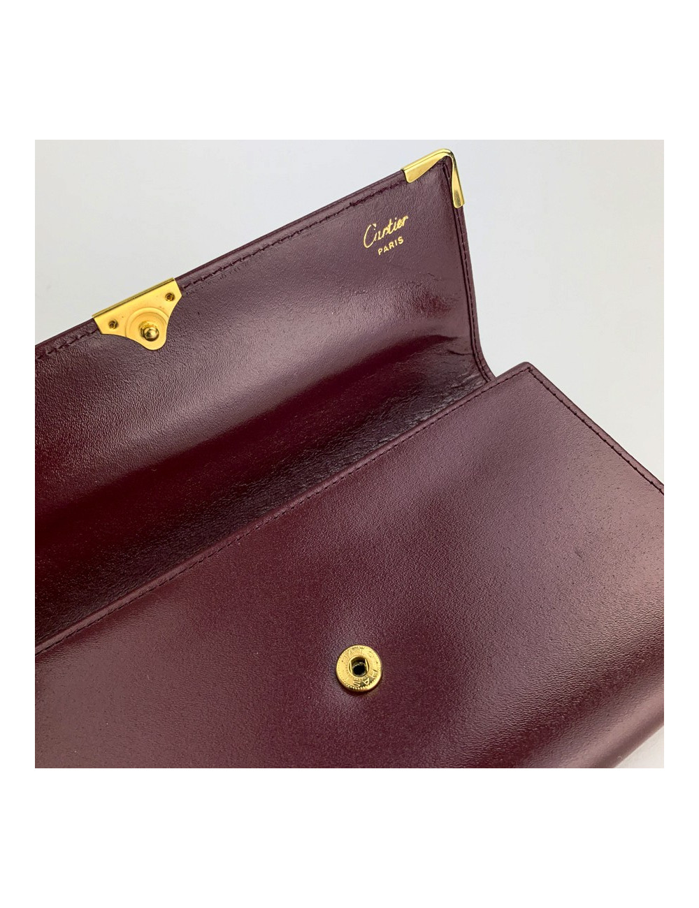 Cartier portefeuille cuir bordeaux