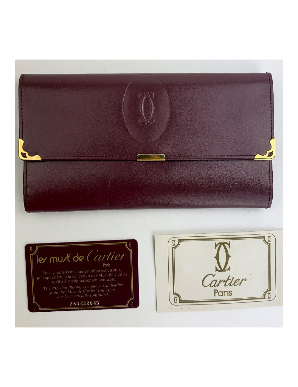 Cartier portefeuille cuir bordeaux