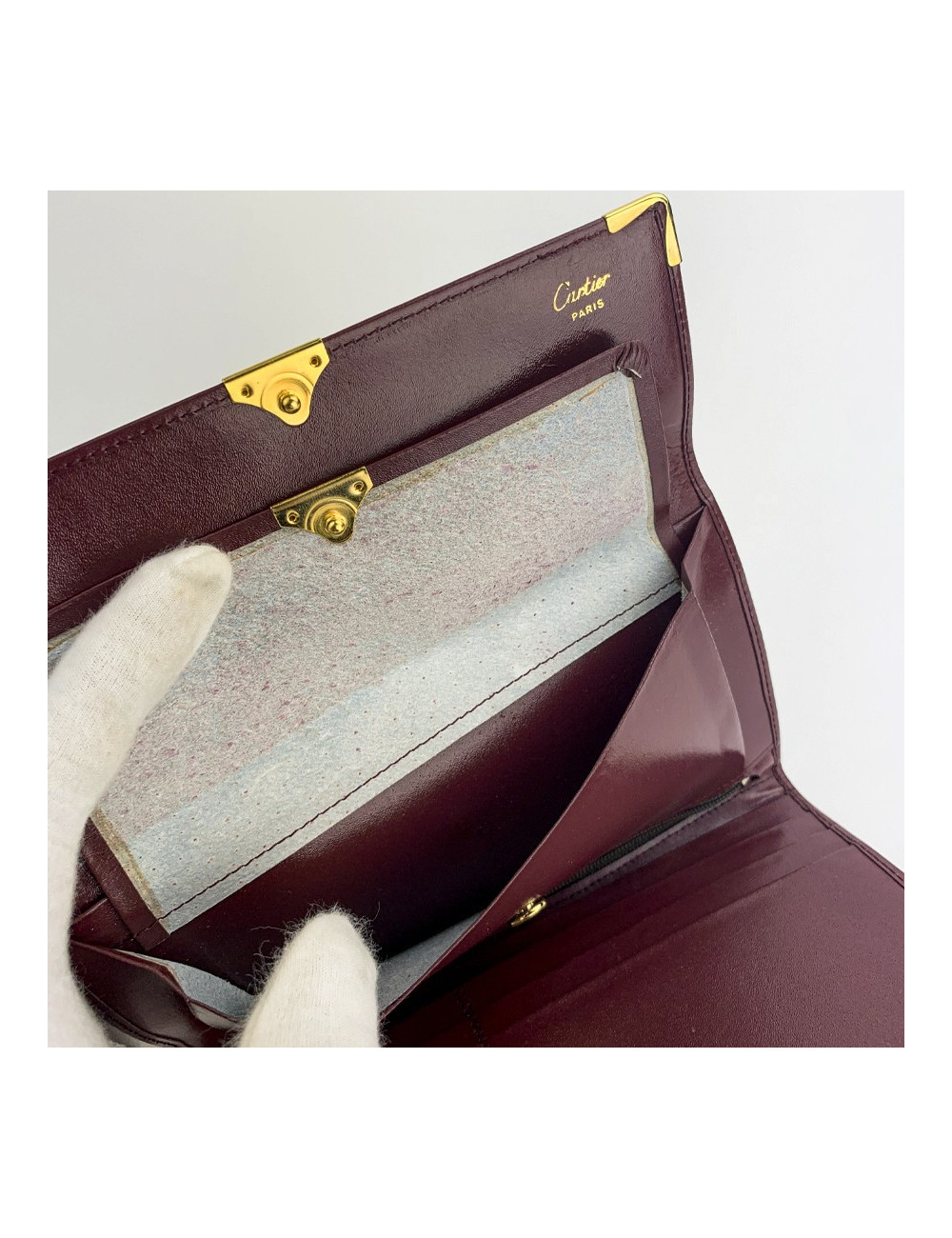 CARTIER wallet in burgundy leather - certified pre-owned luxury