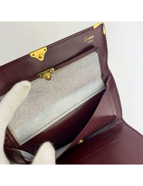CARTIER wallet in burgundy leather - certified pre-owned luxury