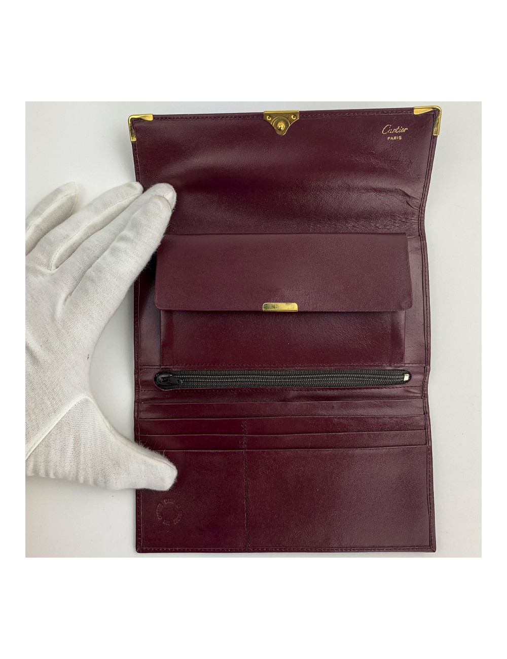 CARTIER wallet in burgundy leather - certified pre-owned luxury