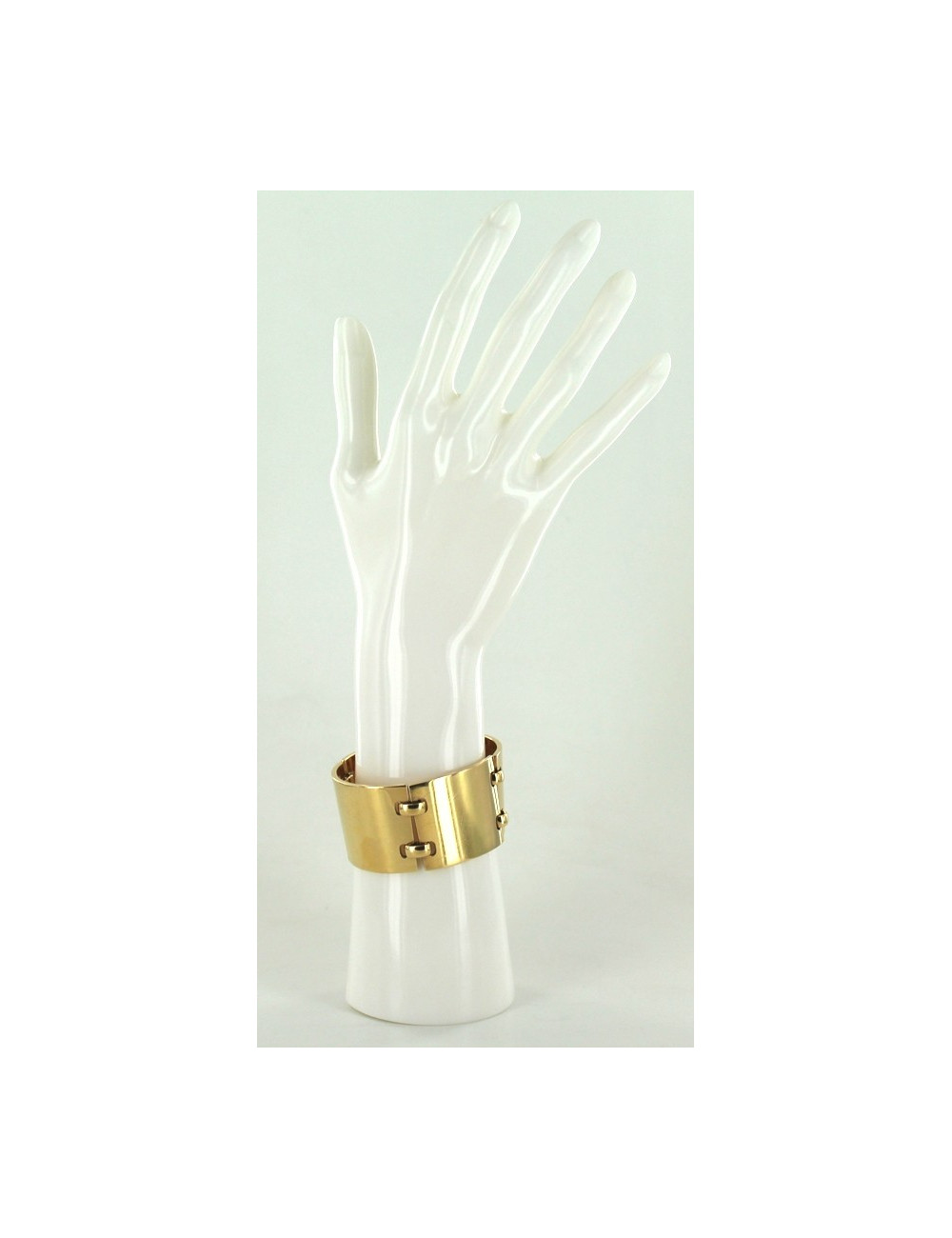 Manchette HERMES articulée en or massif 