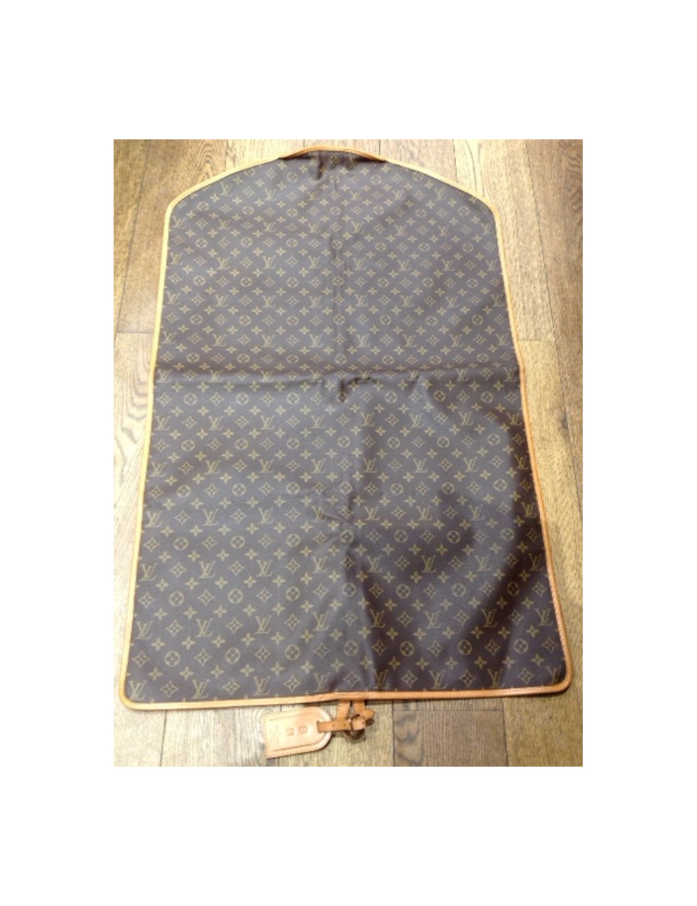 Cover carries LOUIS VUITTON Monogram Canvas clothes