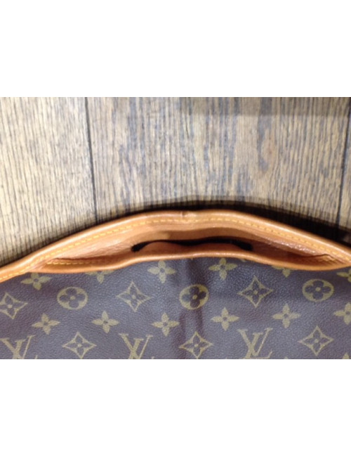 Cover carries LOUIS VUITTON Monogram Canvas clothes