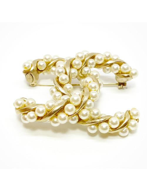Broche CHANEL torsadée dorée et perles