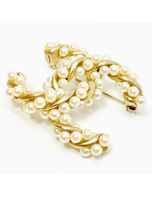 Broche CHANEL torsadée dorée et perles