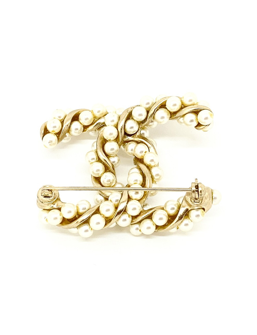Broche CHANEL torsadée dorée et perles