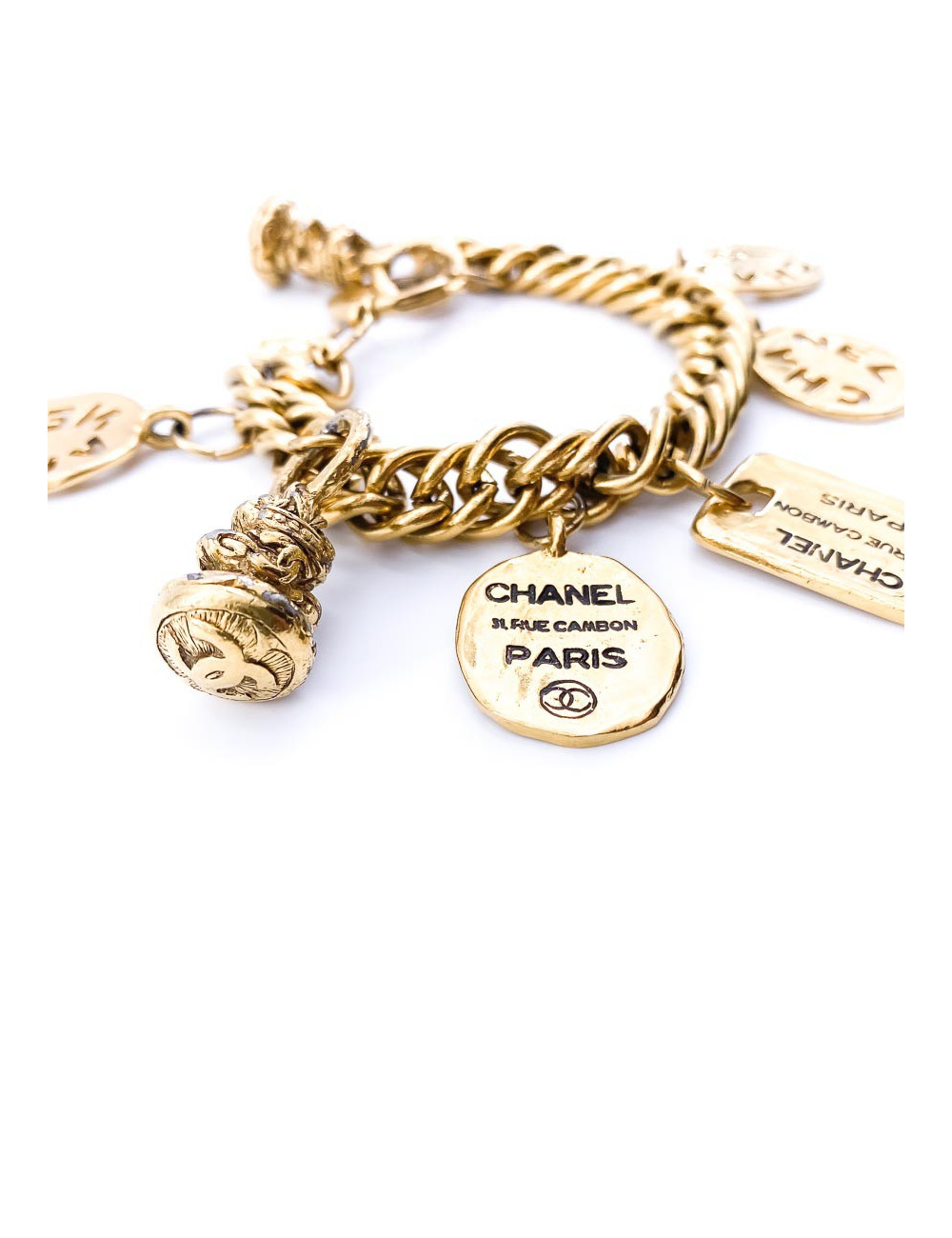 Bracelet breloques CHANEL en métal doré