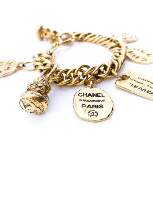 CHANEL Charms Bracelet in Gilt Metal
