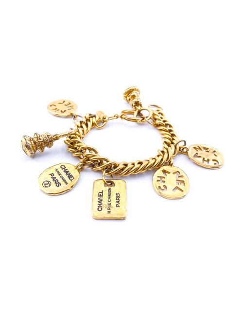 Bracelet breloques CHANEL en métal doré
