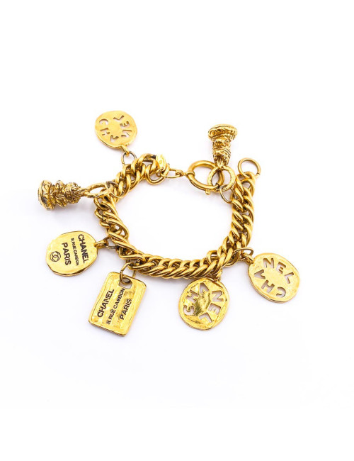 Bracelet breloques CHANEL en métal doré