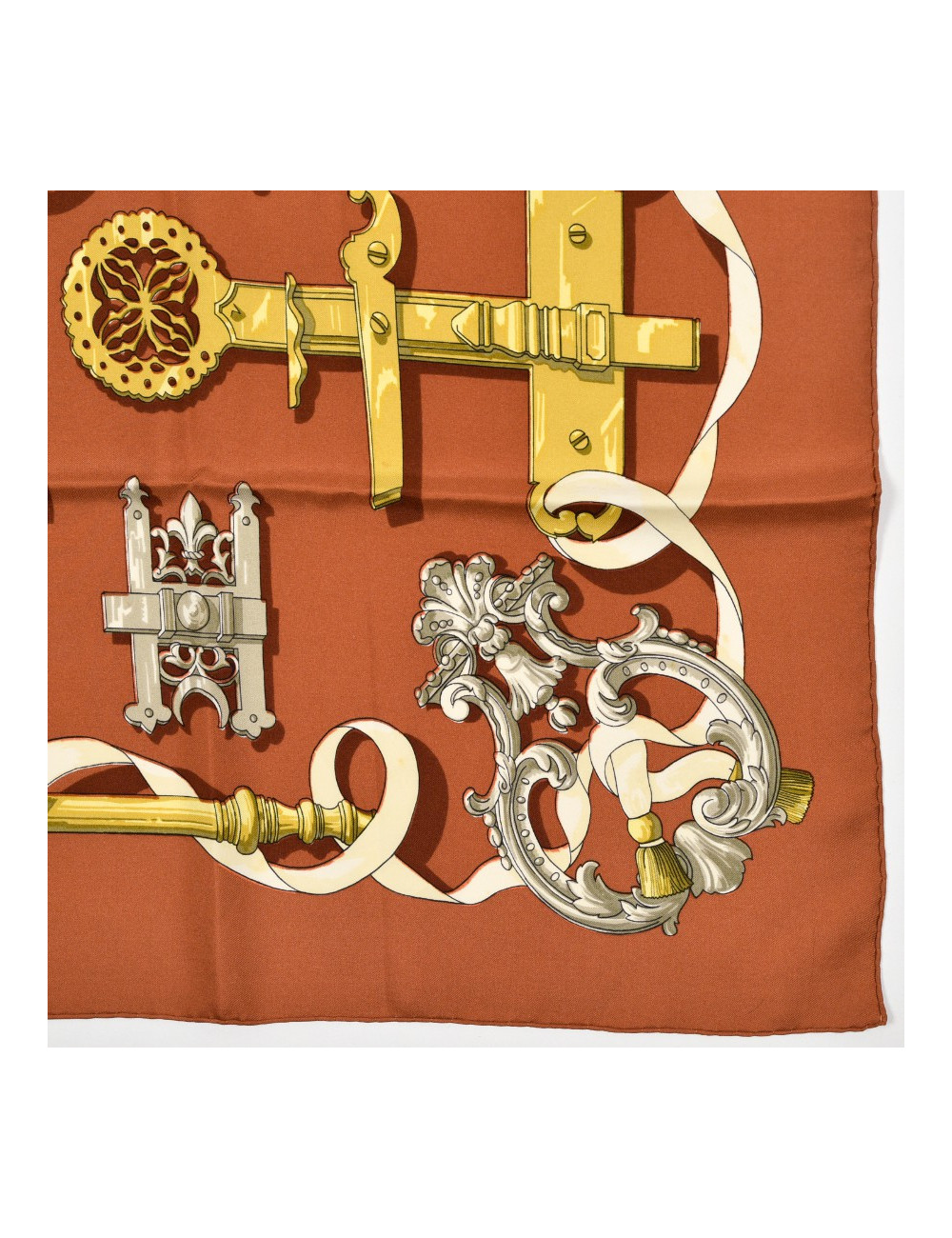 Carré Hermès "Ferronnerie" marron et or