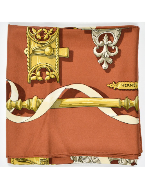 Carré Hermès "Ferronnerie" marron et or
