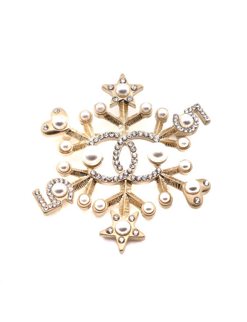 Broche CHANEL 5 dorée en strass et perles nacrées