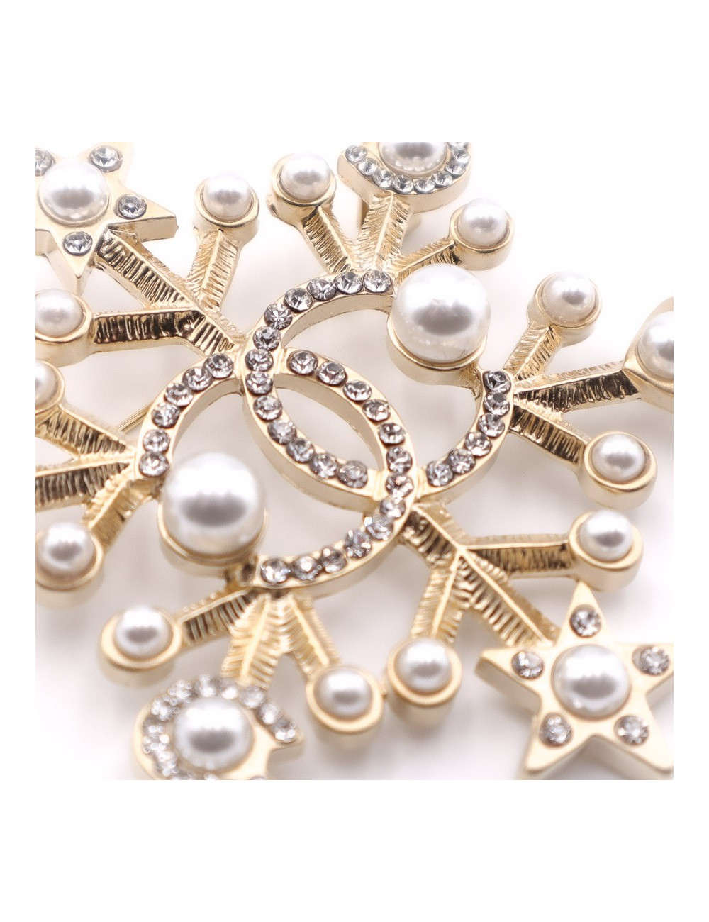 Broche CHANEL 5 dorée en strass et perles nacrées