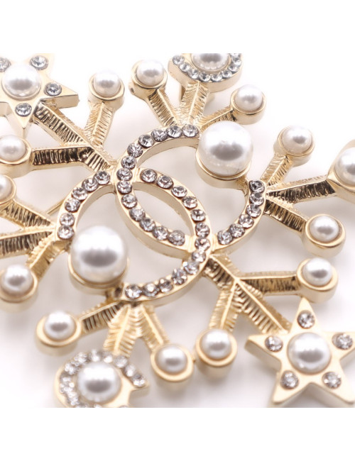 Broche CHANEL 5 dorée en strass et perles nacrées